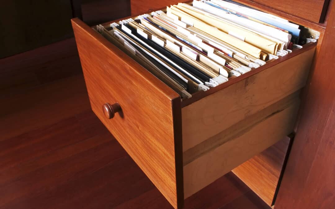 an opened file cabinet drawer