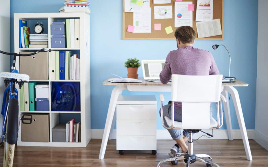 man sitting at a desk