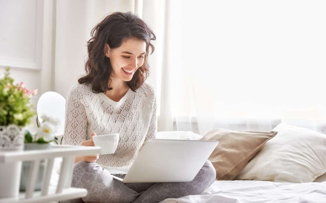 woman looking at laptop